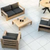 Canapé de jardin 2 places haut de gamme "Zénith" en teck matelassé tissu gris foncé