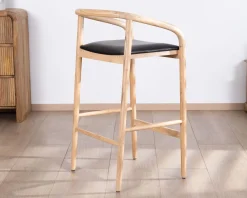 Chaise de bar épurée en acacia naturel et assise PU noir "Vogue"