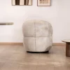 Chauffeuse effet boule avec surpiqures en tissu bouclette beige tramé "Sweet Culture" esprit cocoon