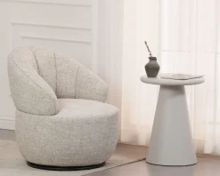 Chauffeuse effet boule avec surpiqures en tissu bouclette beige tramé 