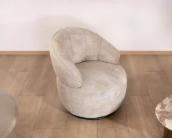 Chauffeuse effet boule avec surpiqures en tissu bouclette beige tramé 