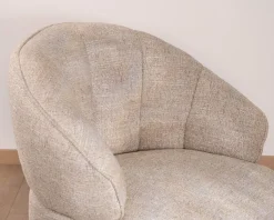 Chauffeuse effet boule avec surpiqures en tissu bouclette beige tramé 