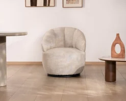 Chauffeuse effet boule avec surpiqures en tissu bouclette beige tramé 