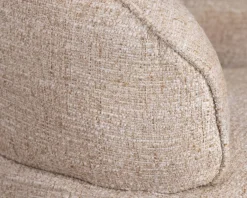 Chauffeuse effet boule avec surpiqures en tissu bouclette beige tramé 