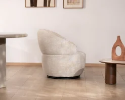 Chauffeuse effet boule avec surpiqures en tissu bouclette beige tramé 