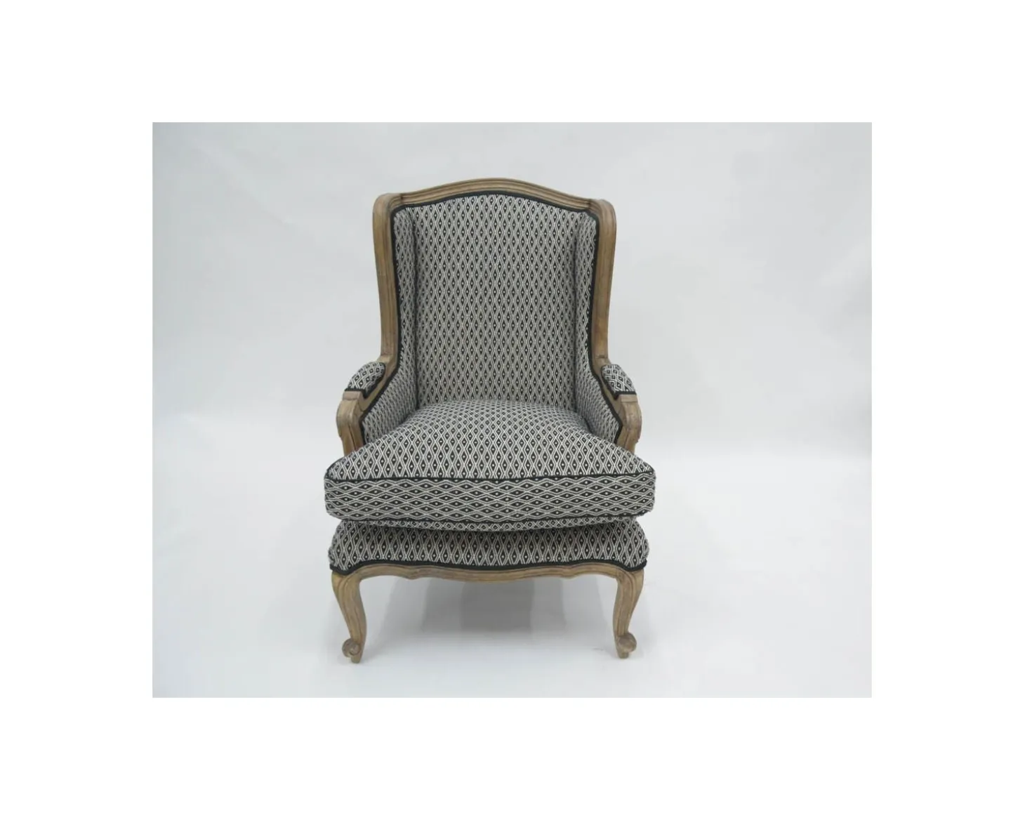 Fauteuil bergère "Sofia" bois massif et tissu noir et blanc à losanges