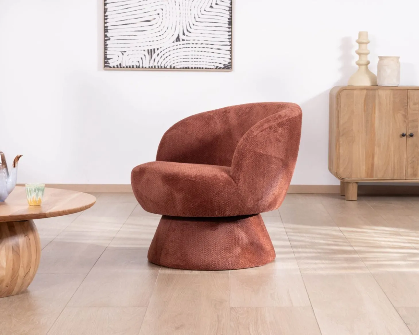 Fauteuil d'appoint pivotant en tissu chenillé terracotta "Ladoga" design enveloppant