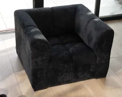 Fauteuil design cubique en velours anthracite avec surpiqures 