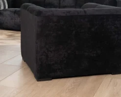 Fauteuil design cubique en velours anthracite avec surpiqures 