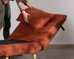 Fauteuil design scandinave en tissu terracotta "Folda" convertible en lit d'appoint