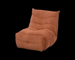 Fauteuil enveloppant en velours côtelé terracotta 