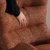 Fauteuil enveloppant et pivotant esprit cocooning et rétro "Calista" en tissu bouclette terracotta