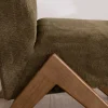 Fauteuil esprit vintage en tissu vert kaki clair "Tolga" pieds boomerang en bois