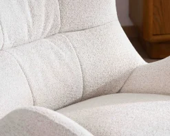 Fauteuil pivotant cocooning en tissu bouclette blanc cassé 