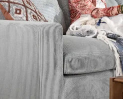 Grand canapé moelleux avec pouf modulaire 