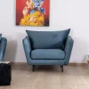 Grand fauteuil cosy en tissu bleu et pieds en métal noir "Hasting"