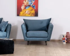 Grand fauteuil cosy en tissu bleu et pieds en métal noir "Hasting"