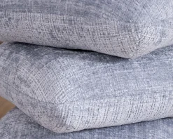 Pouf design pivotant en tissu tramé bleu glacier à reflets lumineux « Flow » esprit scandinave