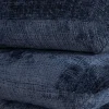 Pouf moderne pivotant « Flow » en tissu tramé bleu nuit finition satinée forme organique