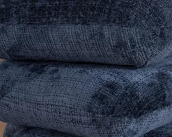 Pouf moderne pivotant « Flow » en tissu tramé bleu nuit finition satinée forme organique