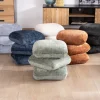 Pouf pivotant « Flow » style contemporain en tissu tramé écru à reflets soyeux