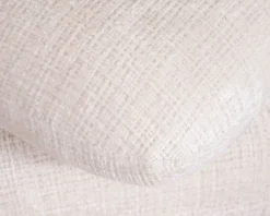 Pouf pivotant « Flow » style contemporain en tissu tramé écru à reflets soyeux