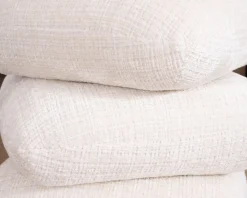 Pouf pivotant « Flow » style contemporain en tissu tramé écru à reflets soyeux