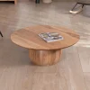 Table basse design en acacia massif ronde avec pied boule "Voluto"