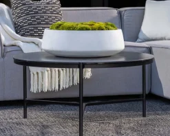 Table basse design noire plateau céramique et structure 3 pieds 