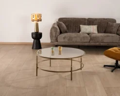 Table basse ronde 90 cm en laiton doré et plateau verre 