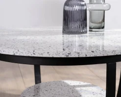 Table basse ronde en terrazzo blanc et métal noir 