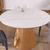 Table ronde 120 cm plateau céramique blanc effet marbre "Oria" piètement aspect chêne