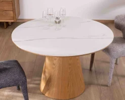 Table ronde 120 cm plateau céramique blanc effet marbre "Oria" piètement aspect chêne