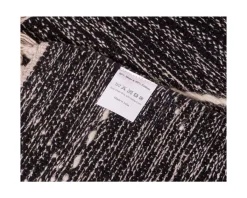 Tapis en laine et coton noir motif ethnique 